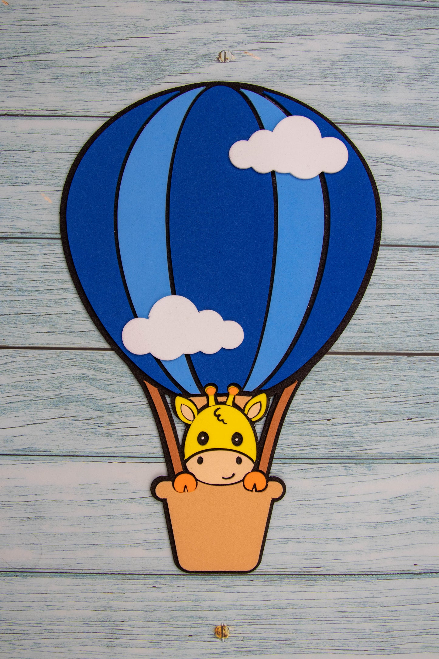 Giraffe with air balloon